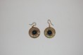 Pendientes dorados piedra negra